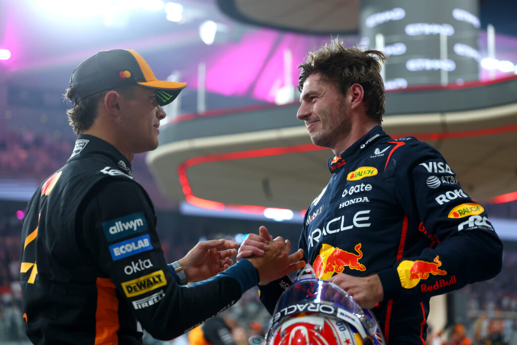 Pole position qualifier Max Verstappen of the Netherlands and Oracle Red Bull Racing and Second placed qualifier Lando Norris of Great Britain and McLaren congratulate each other in parc ferme during qualifying ahead of the F1 Grand Prix of Abu Dhabi at Yas Marina Circuit on December 06, 2025 in Abu Dhabi, United Arab Emirates.