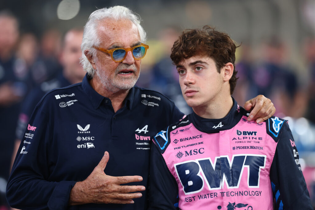 Flavio Briatore, Executive Advisor of Alpine F1 with Franco Colapinto of Argentina and Alpine F1 during qualifying ahead of the F1 Grand Prix of Abu Dhabi at Yas Marina Circuit on December 06, 2025 in Abu Dhabi, United Arab Emirates.