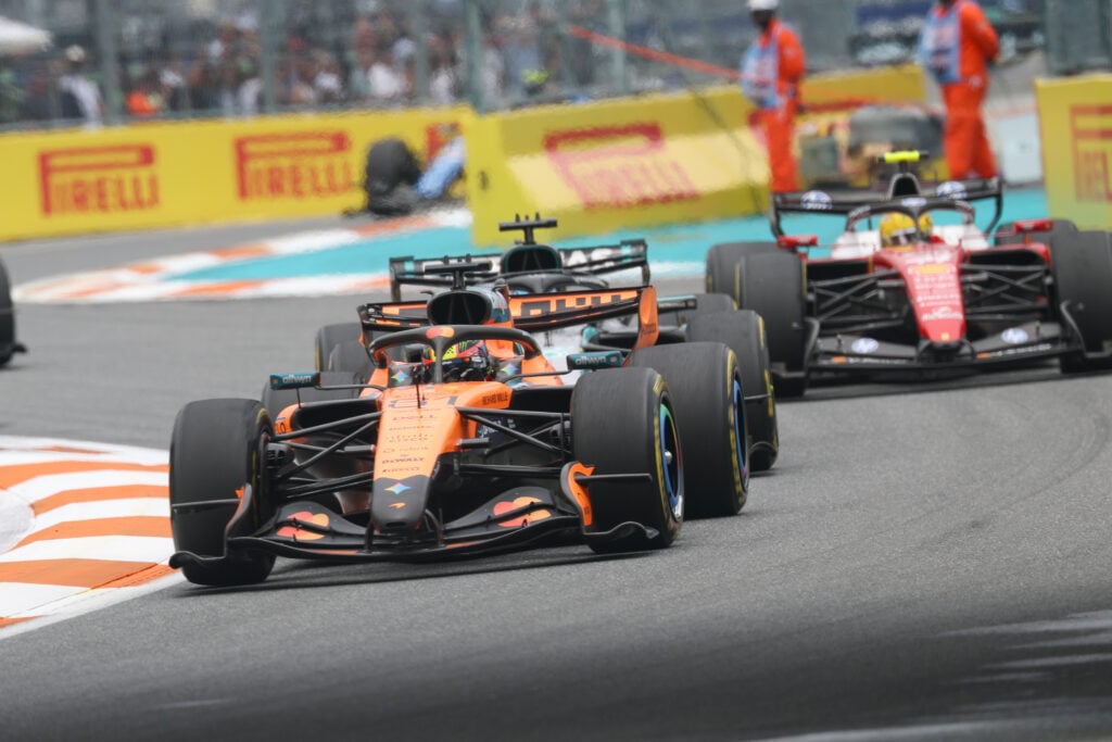 McLaren's Oscar Piastri leads Mercedes' George Russell and Ferrari's Lewis Hamilton on track during the 2026 F1 Miami Grand Prix