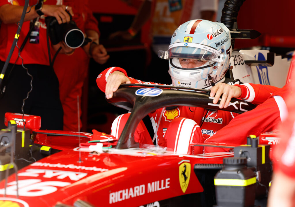 Ferrari driver Charles Leclerc gets in his car in the garage before the 2026 F1 Miami Grand Prix