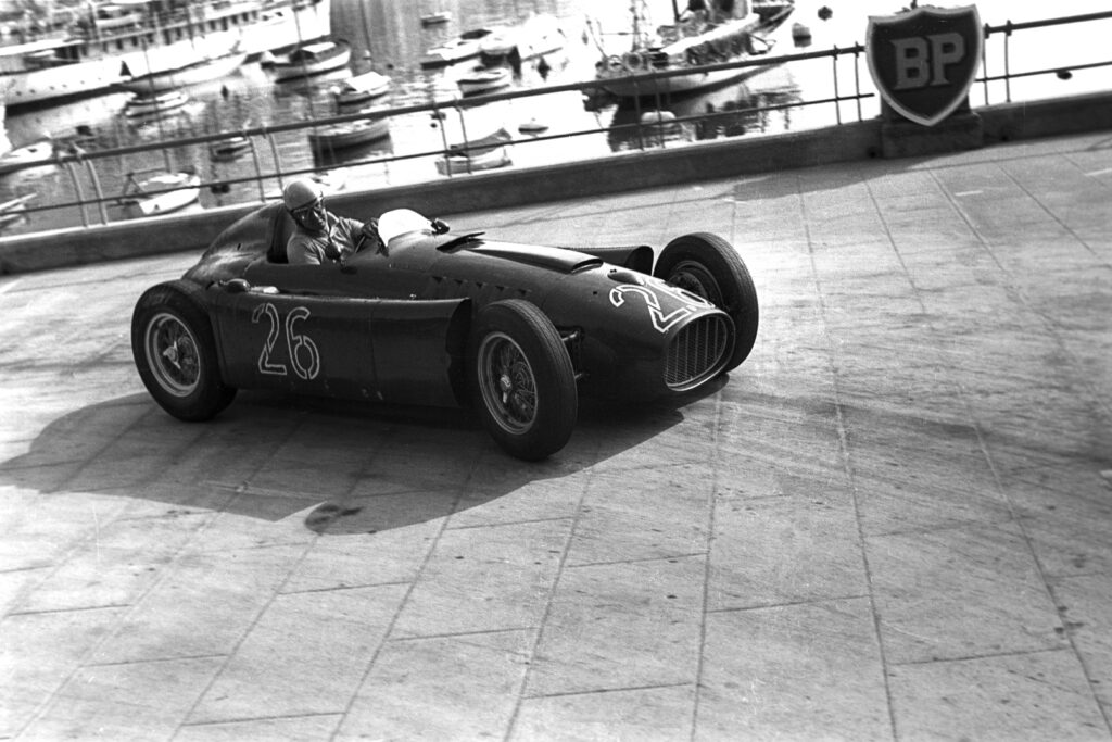 Albert Ascar driving his Lancia F1 car at the 1955 Monaco Grand Prix.