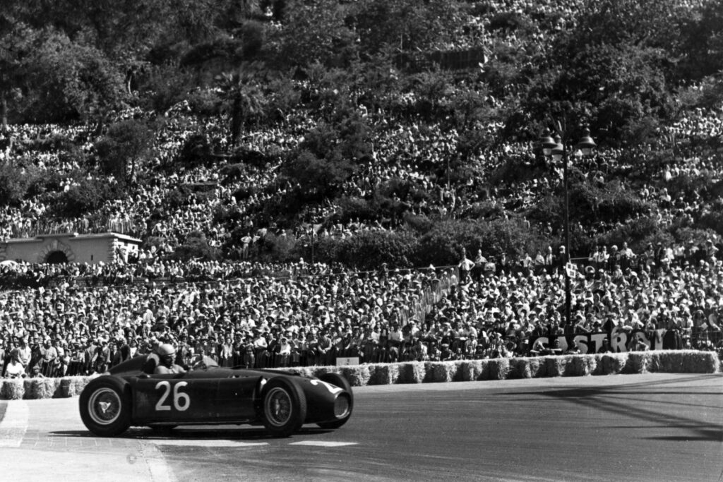 Albert Ascar driving his Lancia F1 car at the 1955 Monaco Grand Prix.