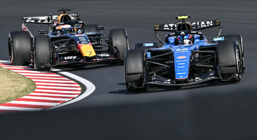 Williams driver Carlos Sainz on track with Red Bull's Max Verstappen during practice at the 2026 F1 Japanese Grand Prix