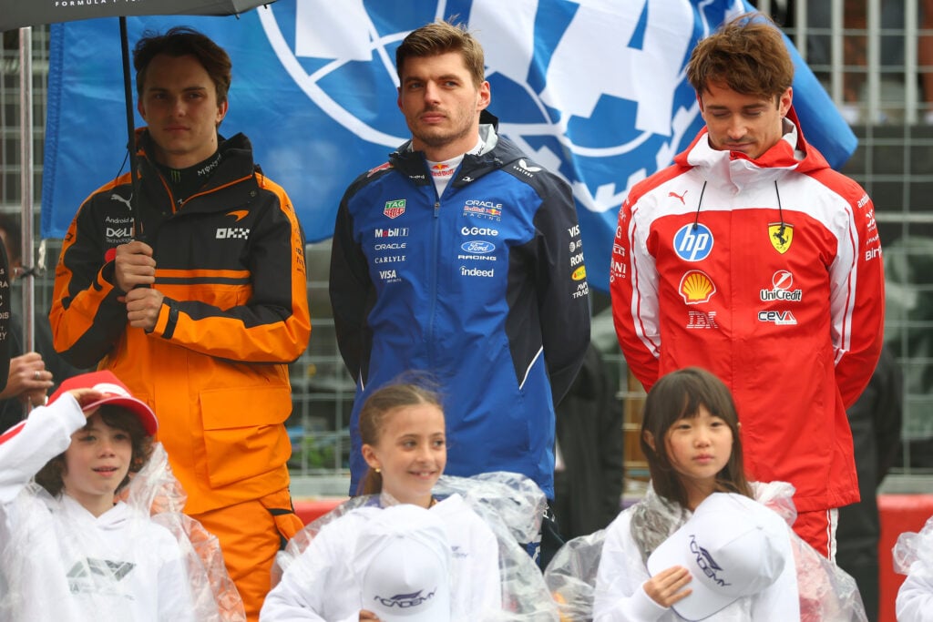McLaren's Oscar Piastri, Red Bull's Max Verstappen and Ferrari's Charles Leclerc attend the national anthem before the 2026 F1 Canadian Grand Prix