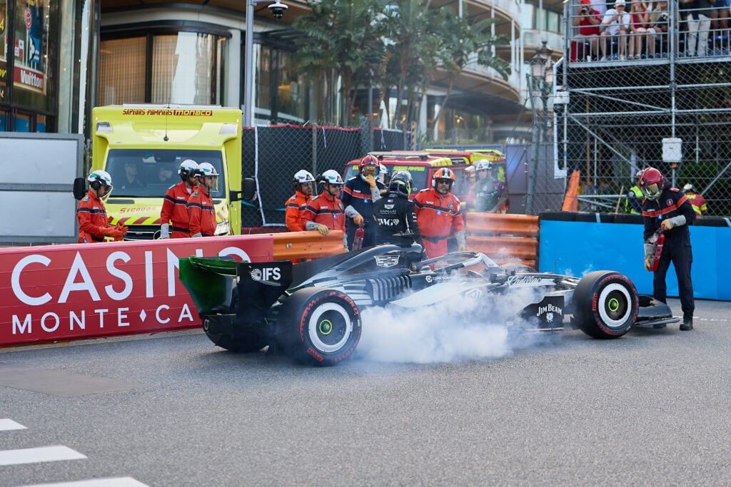 Sergio Perez faces a brake fire in his Cadillac during FP2 at the 2026 Monaco Grand Prix.