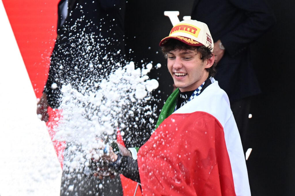 Kimi Antonelli of Mercedes celebrates on the podium after winning the 2026 Monaco Grand Prix