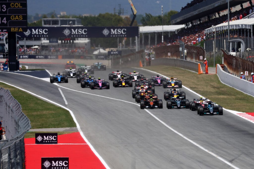 Mercedes' George Russell leads Ferrari's Lewis Hamilton at the start of the 2026 F1 Barcelona-Catalunya Grand Prix