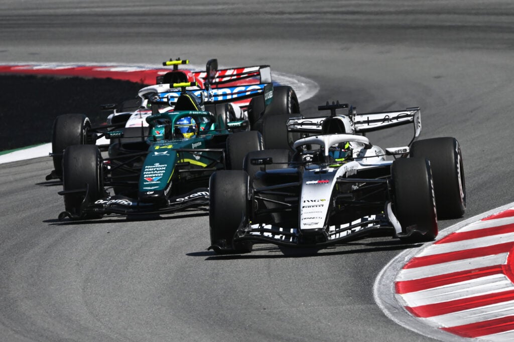 Cadillac driver Sergio Perez leads Aston Martin's Fernando Alonso on track during the 2026 F1 Barcelona-Catalunya Grand Prix