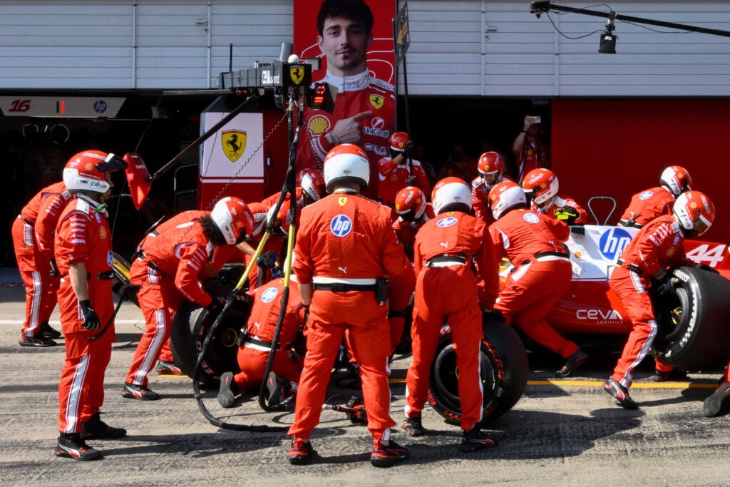 Lewis Hamilton of Ferrari enters the pit lane to change tyres during the Austrian Grand Prix.