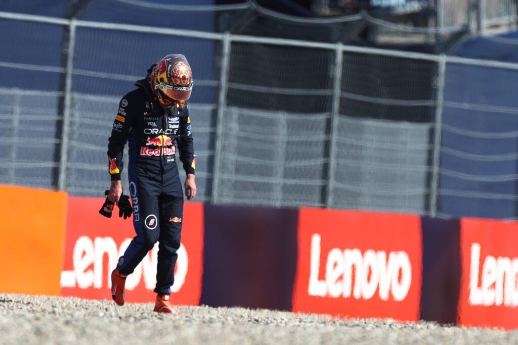 Red Bull driver Max Verstappen walks away after crashing during qualifying for the 2026 F1 Austrian Grand Prix
