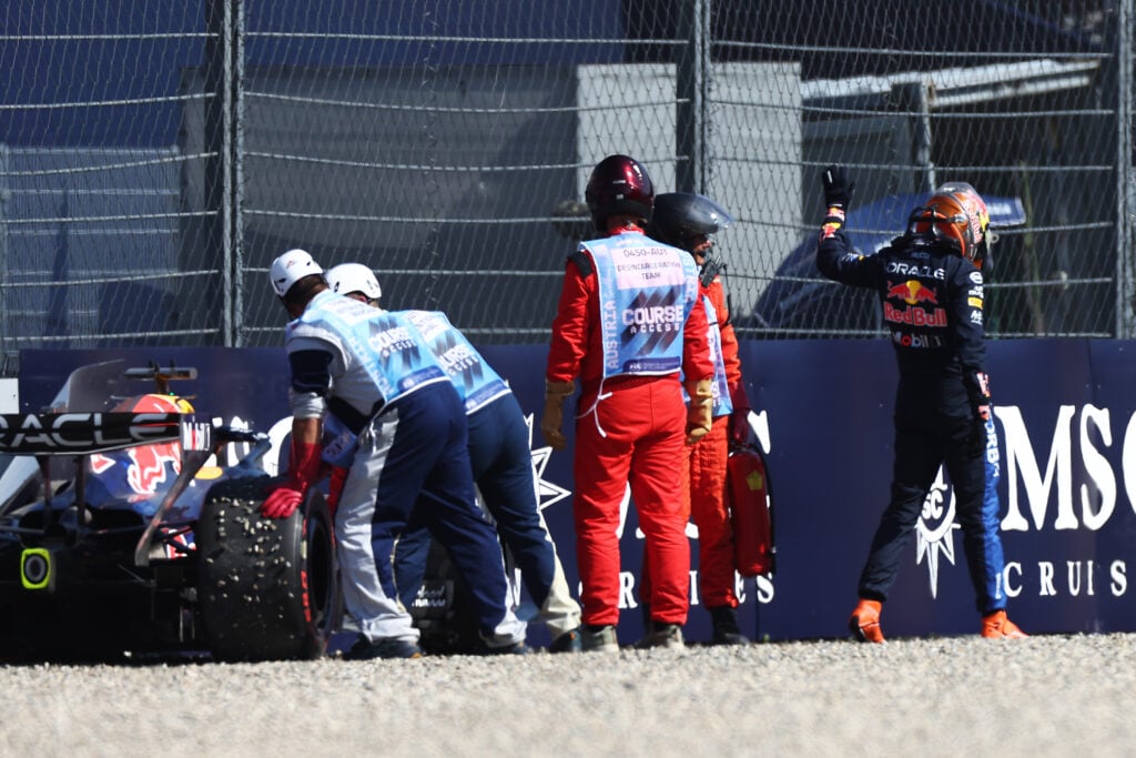 Red Bull driver Max Verstappen walks away after crashing during qualifying for the 2026 F1 Austrian Grand Prix