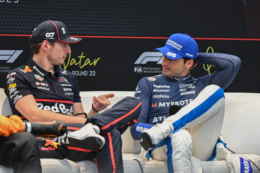 Red Bull driver Max Verstappen speaks with Williams' Carlos Sainz in a press conference at the 2025 F1 Qatar Grand Prix