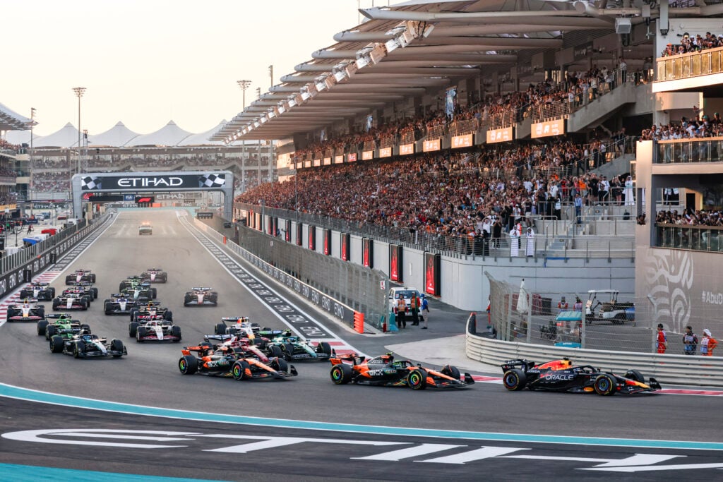 Red Bull's Max Verstappen leads the start of the 2025 F1 Abu Dhabi Grand Prix