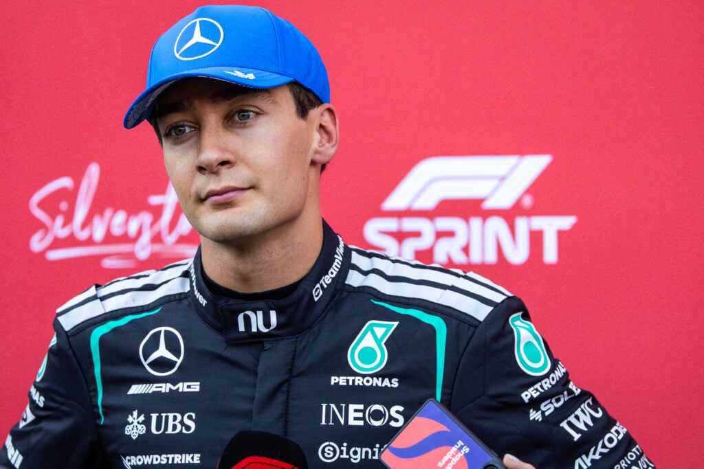 George Russell of Mercedes speaks to the press after the British Sprint at Silverstone.