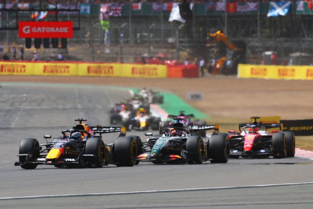 Red Bull driver Max Verstappen leads McLaren's Oscar Piastri on track during the Silverstone Sprint at the 2026 F1 British Grand Prix