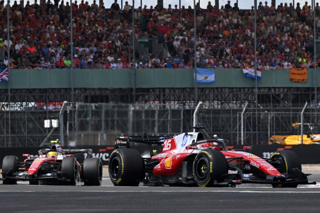 Ferrari driver Charles Leclerc leads teammate Lewis Hamilton on track at Silverstone during the 2026 F1 British Grand Prix