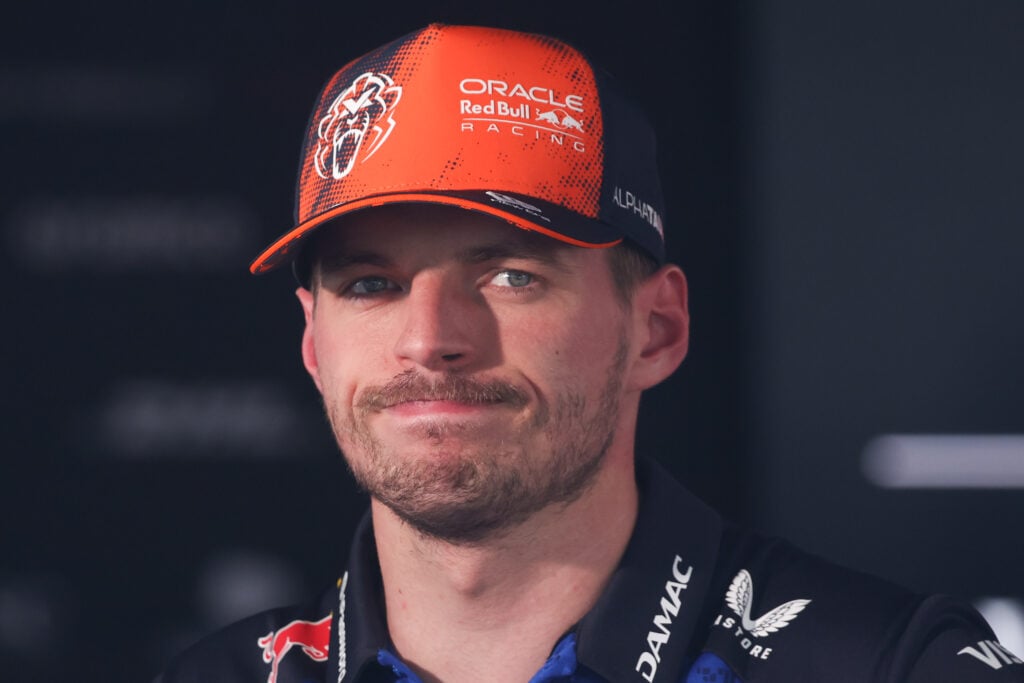 Max Verstappen frowning in the media pen after qualifying at the 2026 Hungarian Grand Prix.