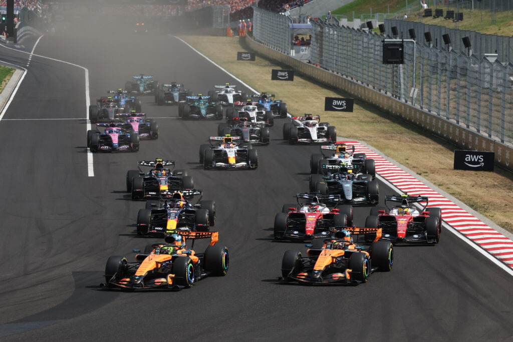 A view of Lando Norris and Oscar Piastri leading the race at the start of the Hungarian Grand Prix.