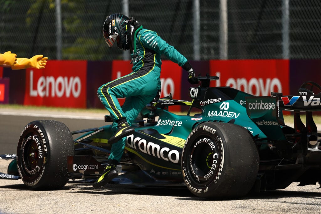 Aston Martin driver Lance Stroll gets out of his car after a suspension failure during FP1 at the 2026 F1 Hungarian Grand Prix
